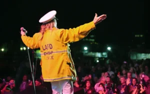 Live concert stage setup on USS Iowa deck for first responders benefit, designed and produced by Evolution, an experiential marketing agency handling live activations and premieres.
