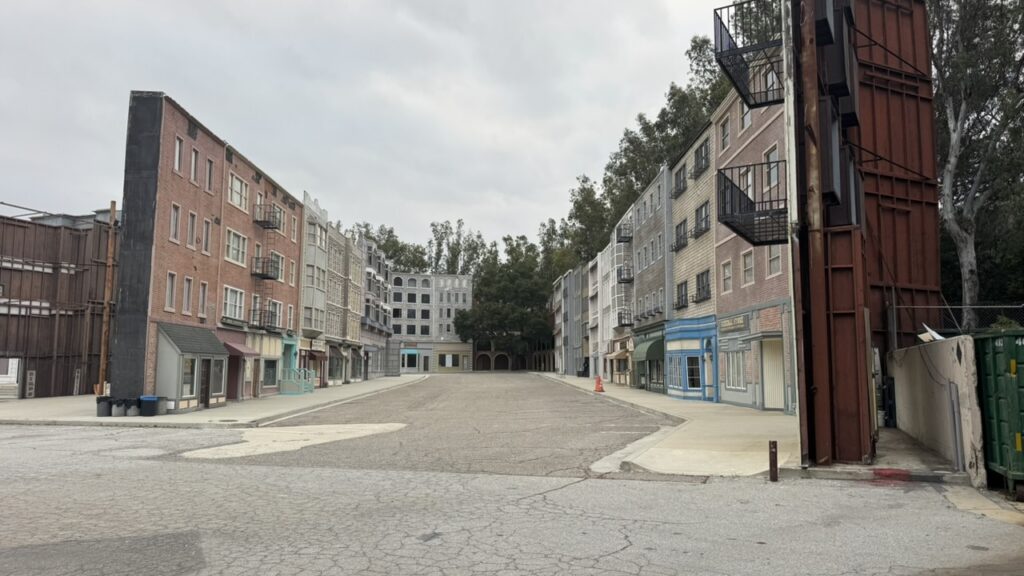 Behind-the-scenes commercial video production filming on a Hollywood studio backlot street for the NYRA Bets campaign